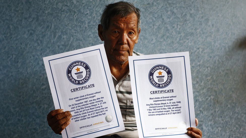 Ang Rita Sherpa holds the Guinness World Record Certificates. Courtesy: Thaneswar Guragai