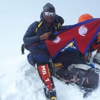 Successful ascent to Summit of Mt. Dhaulagiri with Nepal flag